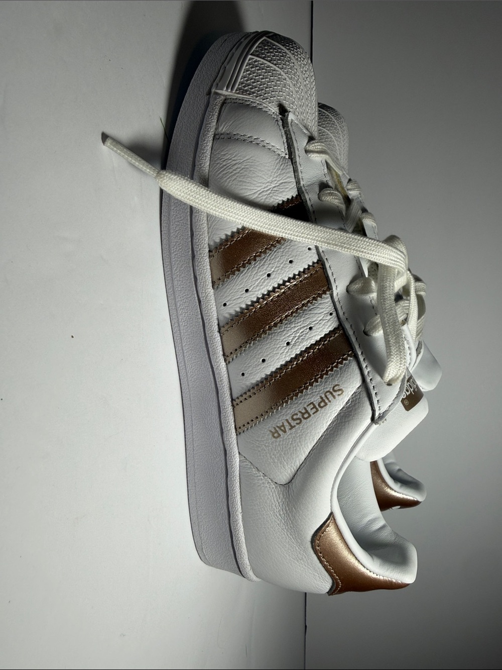 adidas Womens Superstar Leather Sneaker - White with Metallic Bronze Stripes